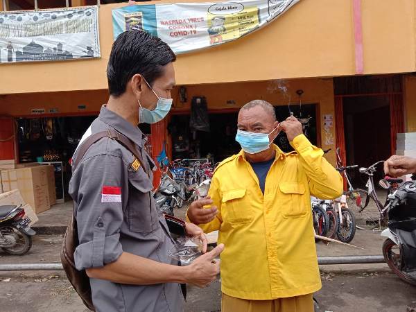 SMSI Kota Metro Bagikan Masker Kepada Masyarakat